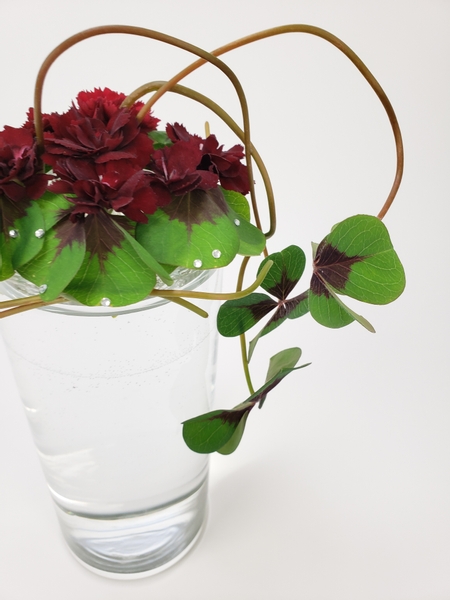 Oxalis and carnation floral arrangement