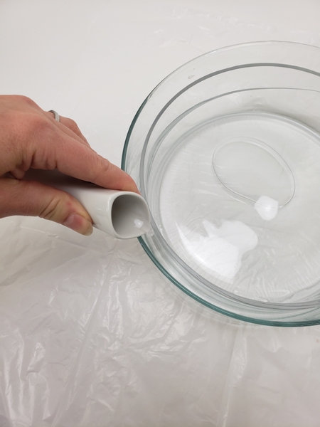 Slip one bowl container into another slightly bigger container