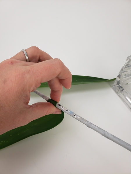 Roll a large leaf over a thin stick like a dowel