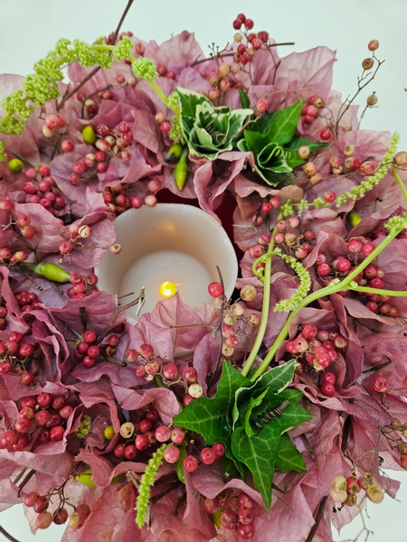 Dried floral disk for a pretty pink flower arrangement