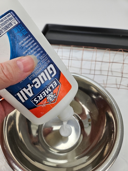 Pour wood glue into a bowl