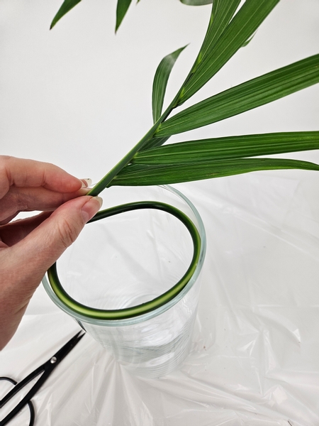 Roll the palm leaf again inside your display container