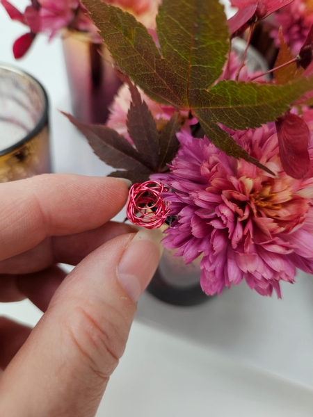 And tuck the tiny wire baubles in and around the designs