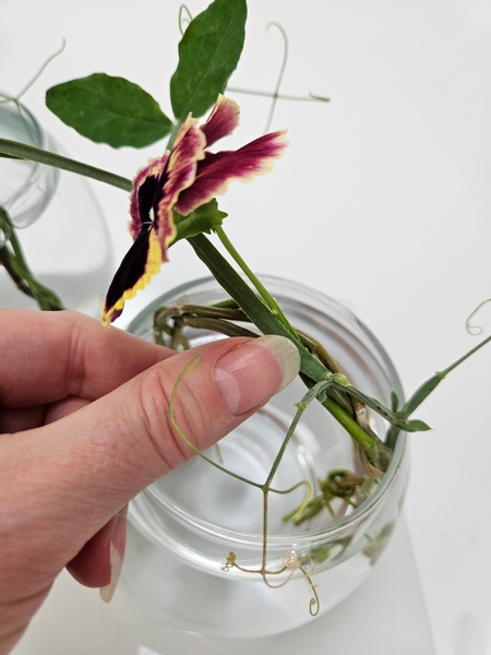 Slip a flower stem through the braid