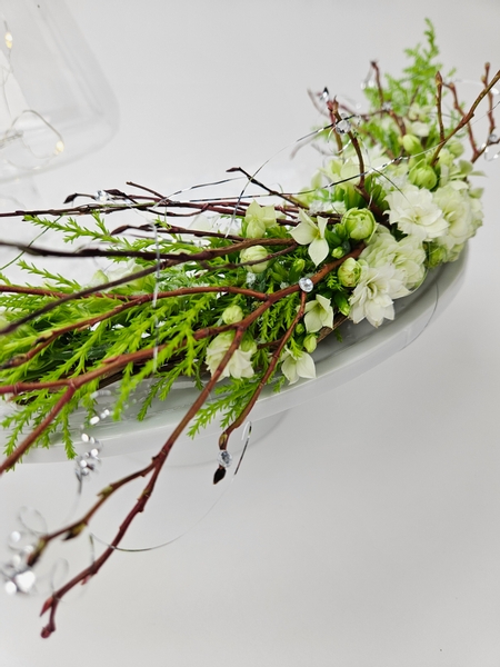 A white Christmas flower arrangement using zero floral foam