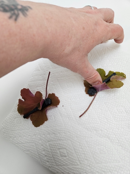 And allow the natural swirl of the leaf to fold over the magnet