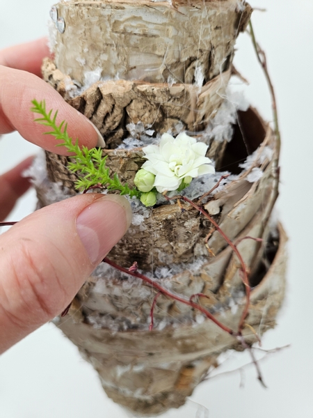 And build up tiny arrangements by adding buds and sprigs of lemon cypress