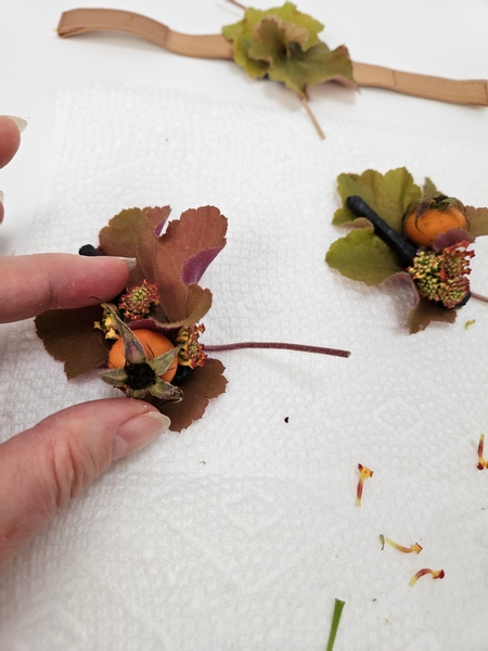 Glue the lantana buds into the design