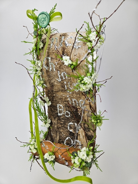 Birch bark and kalanchoe scroll floral display