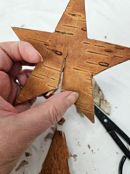 Cut into the star and split it slightly open