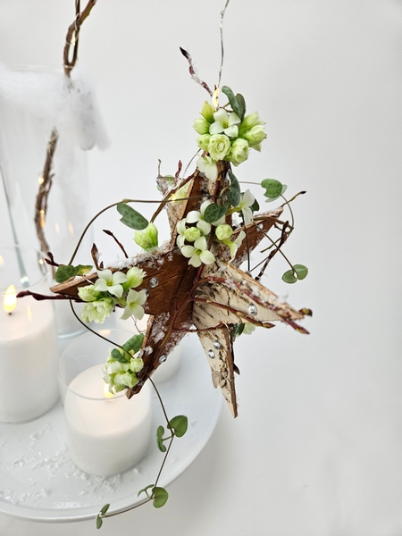 Floral mobile with a birch bark star