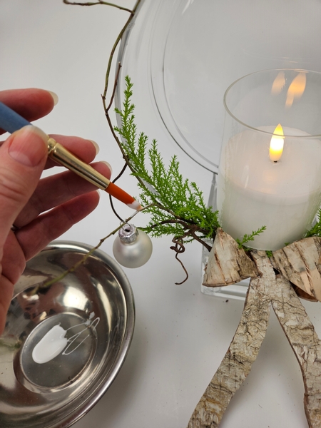 Paint the twigs with a bit of thinned wood glue