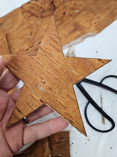 Retrace the shape on to birch bark and cut it out