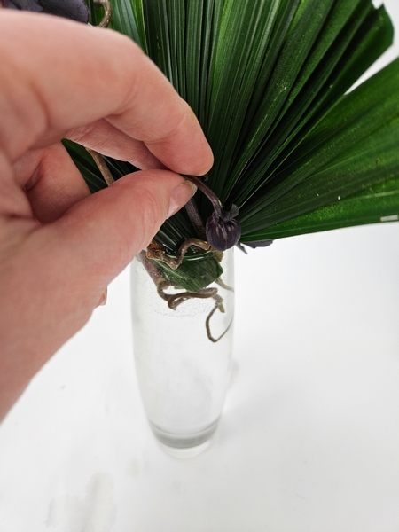 Insert a few flower buds lower into the fan