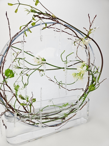 Light and airy floral display using glass