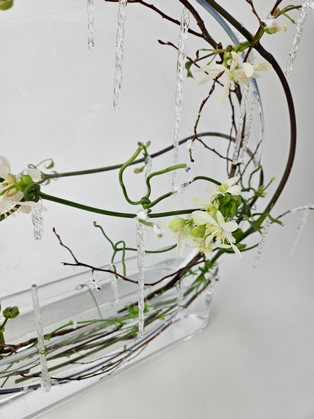 Using double vases to display flowers to design out waste from a flower arrangement