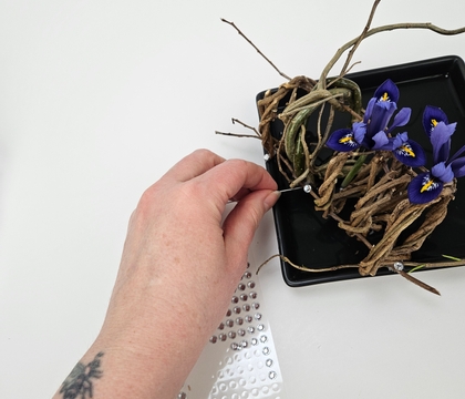 Thread your wreaths in a row to show off your "it could (almost) be mistaken for Spring sprouts"