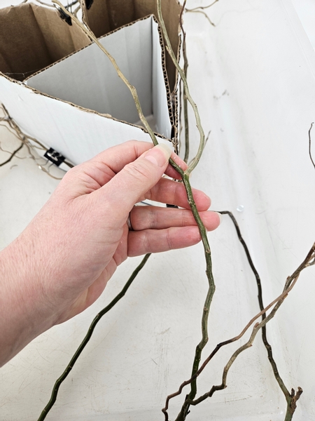 Any handy forks in the willow twigs are ideal to split into a support for the heart