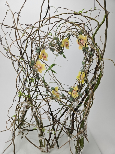 Heart shaped space in twigs flower arrangement