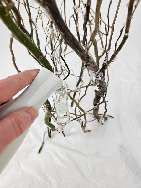 Pour water into the water tubes to keep the thirsty willow hydrated