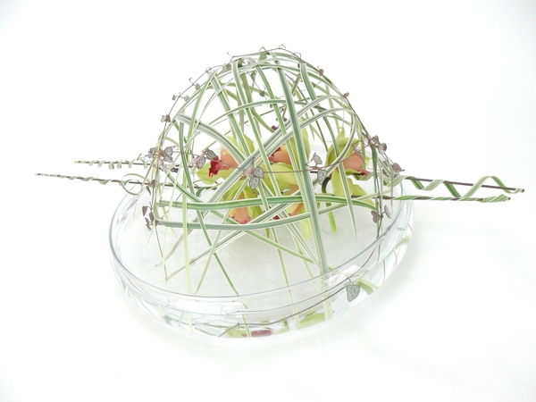 Grass and orchid dome floral design