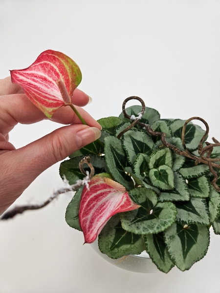 Slip in a few anthurium flowers