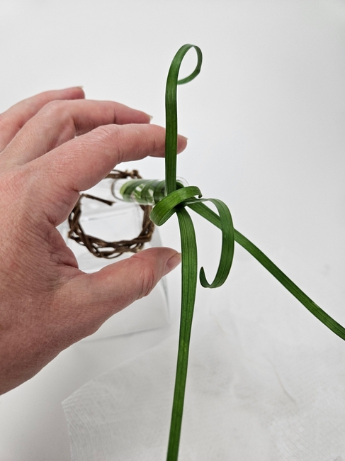 Tiny wreath to balance a water tube… with a twist