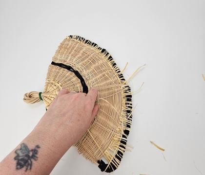 Weaving a fan