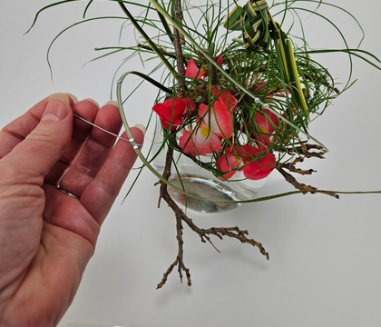 Turn, tuck and refine a papyrus disk bird’s nest armature