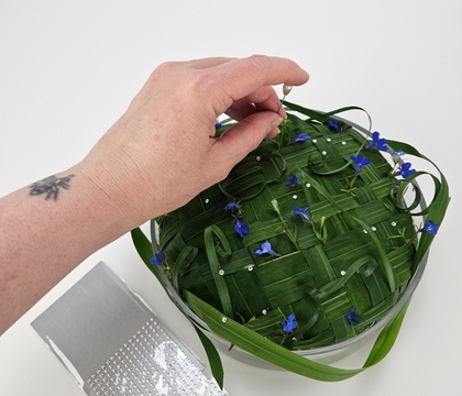 Create a woven base for a “prettiest flower of the moment” display